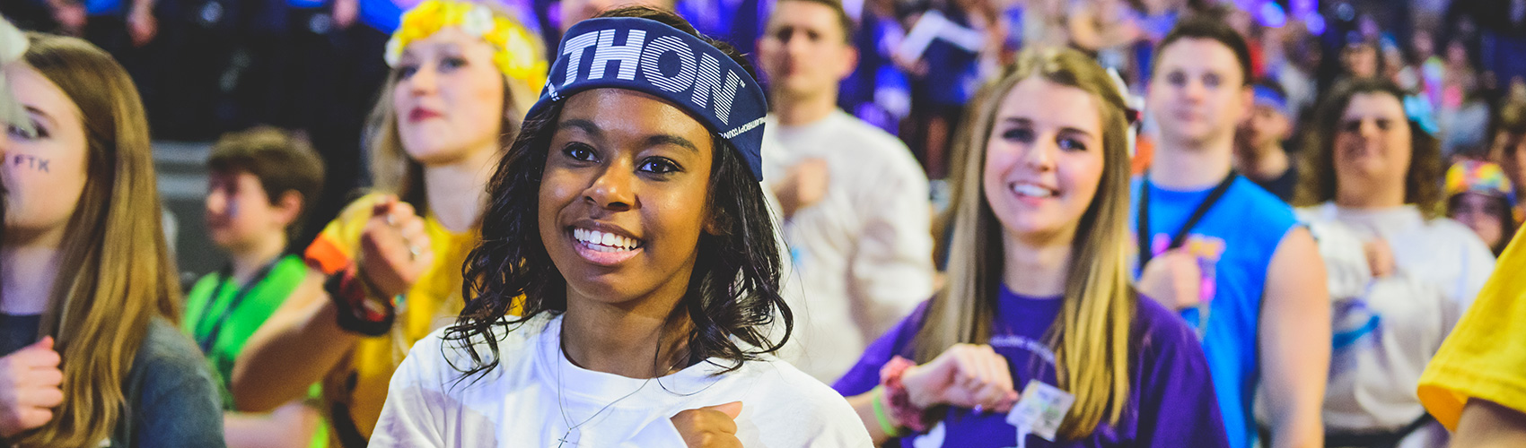 Student at THON with hand on heart